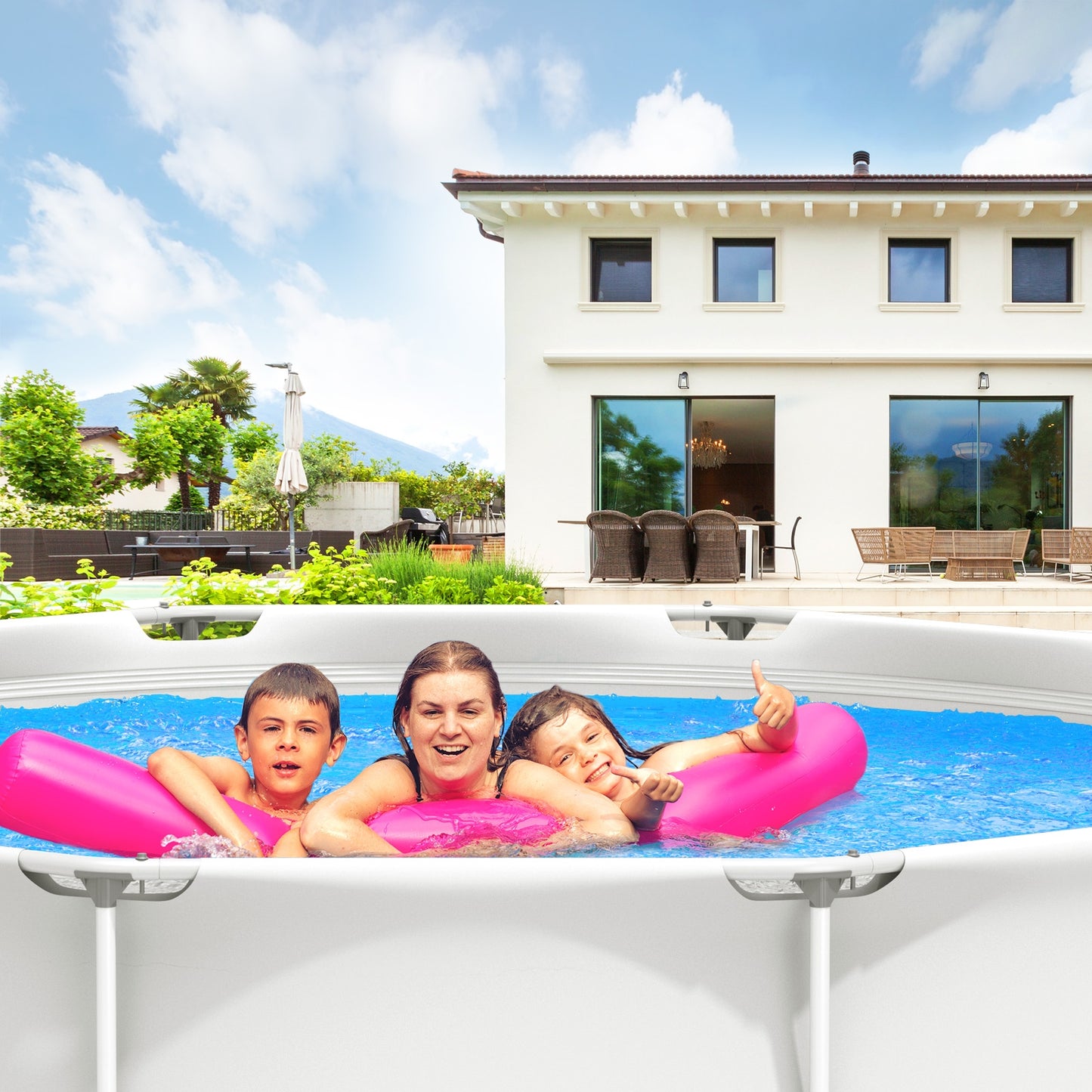 A family enjoying in an above ground round swimming pool with a pool cover, in a backyard setting, with a gray pool cover.