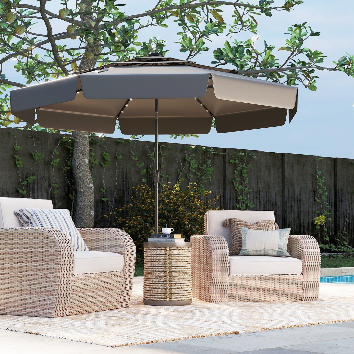 A 10 feet solar patio umbrella with a 3-tier vented top in gray, beige, and navy colors, featuring an auto tilt design, solar-powered LED lights, and a crank handle, surrounded by outdoor furniture on a patio.